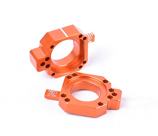 Main image of Ride Engineering Billet Axle Blocks KTM SX/SX-F/XC/XC-F 13-22 (Orange)